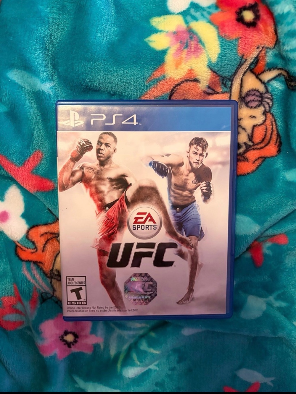 UFC PS4 Game - White Cover with Red & Blue Fighters